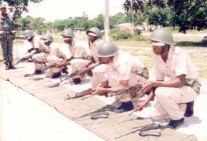 Militiamen on weapon training while blindfolded