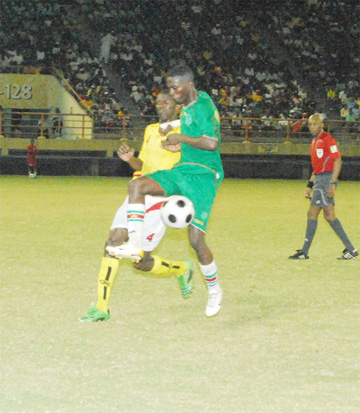 Guyana and Suriname in action at the National Stadium.