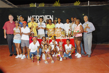 Individual prize winners display their spoils when the curtains came down on the Le Meridien Hotel 2008 Open Tennis championships Monday night. (Photograph by Clairmonte Marcus) 