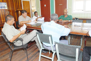President of the Guyana Cricket Board, Chetram Singh, second left, briefs the media about the upcoming regional one-day competition. (Clairmonte Marcus photo)    