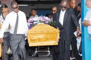 The body of the late athlete Elton Jefford is borne by his sons including  Kaieteur News’ sports journalist Edison, who is second from right. (Clairmonte Marcus photo)        