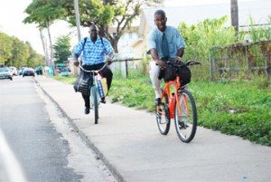 Sidewalk riders: Isn’t the sidewalk for pedestrians to walk on? These cyclists on Smyth Street yesterday seemed to be unaware of this. (Photo by Jules Gibson)  