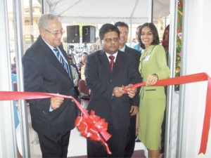 From right: Manager of GBTI Grove/Diamond Branch, Rawattie Mohandeo; GBTI Chief Executive Officer, Radhakrishna Sharma; Minister of Finance, Dr Ashni Singh and Chairman of the GBTI Board of Directors Robin Stoby, SC at the opening ceremony yesterday. 