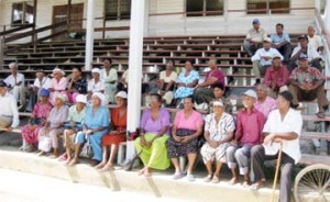 Some of the pensioners waiting on the pavilion of the Bath Community Centre Ground yesterday. 