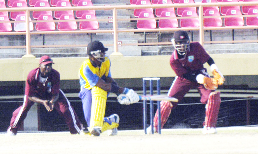 Barbados’ middle-order batsman Dwayne Smith sweeps during his belligerent innings of 82 against the Leeward islands at the Guyana National Stadium yesterday. (Aubrey Crawford photo)  