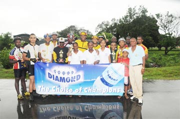 CHAMPIONS CHOICE! The prize winners along with race organizer Hassan Mohammed at right, pose for photographer Clairmonte Marcus.  