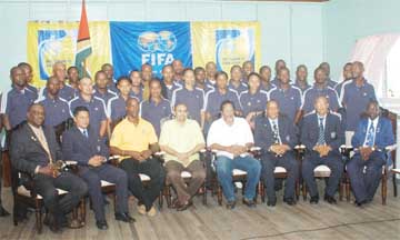 Participants and officials pose for this Aubrey Crawford photo at yesterday’s opening of the FIFA Ma Elite Referee Course.