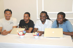 Watch out World, here we come! From left, Kashif Muhammad, Guymine.com webmaster Whiddon Sibdhannie, Muzik Media’s Dexter Pembroke and HYPE TV Production Manager, Gareth Daly, addressing the media at yesterday’s press conference held at Raddison Suites in Queenstown. (Clairmonte Marcus photo)