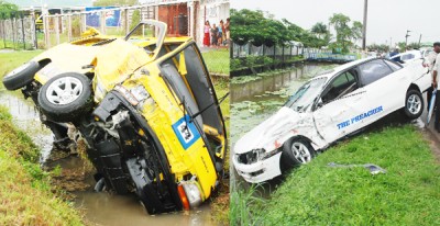 The bus (left) and the car involved in the accident. 
