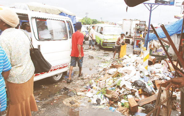 The ubiquitous garbage that helps to fuel floods. This was the scene at the No.45 bus park, Stabroek Market yesterday.