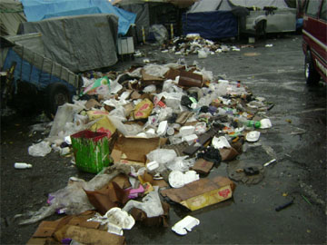 Garbage piled up at the Route 45 bus park on Tuesday afternoon. 