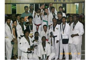 Participants of the fourth Guyana Taekwondo Association’s Dando Cup display their medals at the conclusion of the competition.  