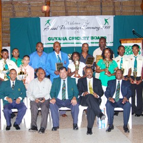 The various award winners and cricket board officials at the Guyana Cricket Board annual awards ceremony on Friday night at the Umana Yana. (Lawrence Fanfair photograph) 