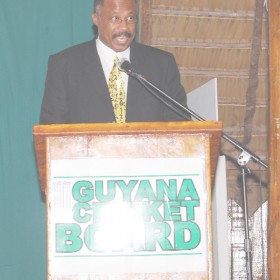 Professor Sir Hillary Beckles delivering the feature address at the Guyana Cricket Board annual awards ceremony Friday night at the Umana Yana. (Lawrence Fanfair photograph)      