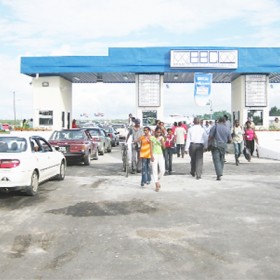  Vehicles making their way through the toll booth free of charge yesterday 