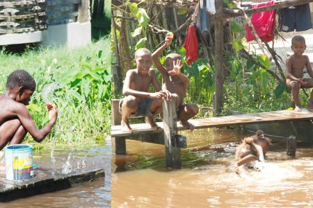 A no-no: With the deadly disease leptospirosis lurking in flooded areas, as Minister of Health Dr Leslie Ramsammy warned yesterday at a press conference, these children were yesterday not just playing in water but with fire at Ann’s Grove, East Coast Demerara. (Composite photo by Jules Gibson) 