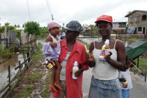  Victoria residents displaying the bleach and medication that were distributed to them yesterday. 