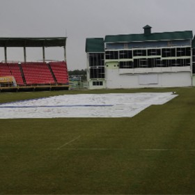 The pitch at the Guyana National Stadium is under covers, due to rain which prevented any play on the first day of the scheduled practice game between the national team and a Rest XI yesterday. (A Clairmonte Marcus photograph) 