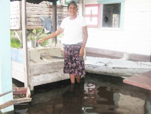 Shankumar Persaud’s wife, Norma still has to cook on her fireside despite the flood.   
