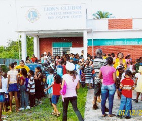 The Lions Club of Central Demerara recently held its annual Christmas party for children from East Bank Demerara communities. In a press release the Club said “Four hundred tickets were distributed to schools from Eccles to Craig.” The children were feted at an afternoon filled with singing, dancing and poetry recitals. Additionally, the Club also hosted a party for differently-able children at the Diamond Special Needs School in addition to its usual party at its den.  In picture: Some of the children and parents at the Club’s Christmas party.  
