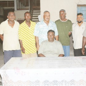  The newly elected executives of the Essequibo Cricket Board (ECB), from left: Carl Brandon (PRO), Edward Skeete (Competitions Committee Chairman), Prince Holder (Marketing Manager), Faizal Bacchus (Vice President), Linden Daniels (Secretary),  Sheik Fazal (Asst. Treasurer) and Brian Christiani (Treasurer). Sitting is president of the ECB Sheik Asif Ahmad. (A Clairmonte Marcus photograph)  