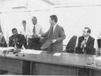 In photo, Permanent Secretary in the Ministry of Foreign Trade and International Cooperation, John Isaacs (standing at left) and Kiyoshi Takeuchi, Ambassador Acting of the Embassy of Japan shake hands after the signing of the agreement.