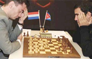 Van Wely, left, and Dominguez battle to a draw during their encounter at the Wijk aan Zee chess tournament in the Netherlands. 