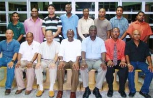 (SeatedLeft to right ) Dale Hing, Lt. Col. Terry Stuart, Richard Fields, Commodore Gary Best, Asst. Commissioner Paul Slowe, Ryan Sampson and Mahendra Persaud. (Standing left to right) Hemant Narine,  Mohammed Qualander, Joseph Chin, Ransford Goodluck, Capt. Samantha Chung, Capt. Lancelot Khan, Dylan Fields and David Dharry.