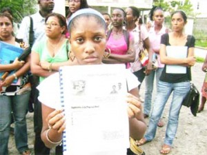 What’s next? This must be the question on Sarah Sancho’s mind as she holds up one of the text books that was handed out by the head of the Inter-America Nursing School. She is yet to receive the $45,000 she had given the woman for her course. 