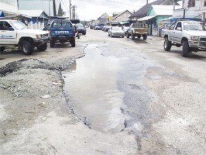 A pothole at First Avenue, Bartica. (See story on page 19) (Gaulbert Sutherland photo)  