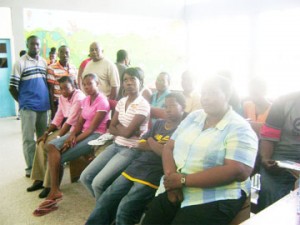 Loraine George (right), the wife of Winston George, who underwent a kidney transplant at the Georgetown Public Hospital, waits with other relatives for him to come out of surgery yesterday. 