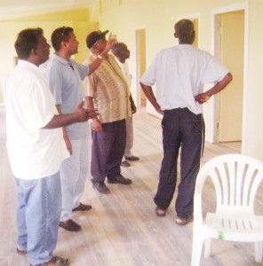 (From left) Essequibo Cricket Board (ECB) president Sheik Ahmad, Guyana Cricket Board (GCB) secretary Anand Sanasie, ECB vice-president Faizool Bacchus and former GCB vice-president Malcolm Peters during a tour of the ECB hostel. Backing the camera is secretary of the ECB Linden Daniels.    