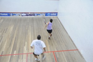 Part of the action in the match-up involving Nicolette Fernandes (right) and Allan Downes (left) in the Bounty Farm Handicap tournament, which Fernandes won 15-12, 15-17, 15-14. (Clairmonte Marcus photo) 