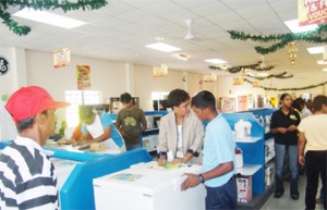 Shoppers at Courts’ new Parika branch.