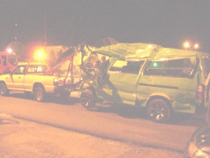 The minibus being towed away from the scene of the accident. 