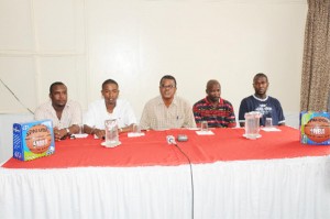 TAKING IT TO ANOTHER LEVEL! From left, NLE representatives Jamaal Douglas and Travis Shepherd, GABF president retired Col. Godwin McPherson and GABA secretary Bobby Cadogan addressing the media at the launching of the 2009 NLE Basketball Tournament. (Clairmonte Marcus photo)   