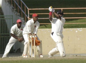 Narsingh  Deonarine  hits over the top during his first innings   143 against Trinidad & Tobago  (Aubrey Crawford photo)