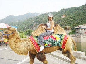 Nicole on camelback in China.