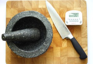 My tools: mortar & pestle, chef’s  knife, cutting board & timer.  (Photo by Cynthia Nelson) 