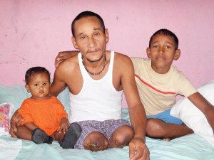 Russell Cornelius and two of his four children