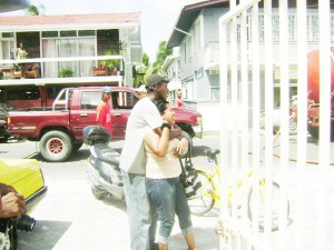 Tears of loss: Mala Moonsammy cries upon arriving at her home only to find the building gutted yesterday.  