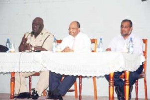 Commisioner of Police Henry Greene, Minister of Home Affairs Clement Rohee and Secretary of the Community Policing Organisation of Guyana Imtaz Zapher Ali. (GINA photo) 