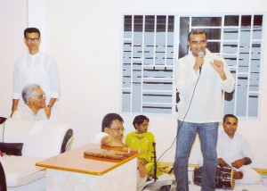 President Bharrat Jagdeo addressing devotees assembled at the Shri Krishna Mandir to celebrate Phagwah. Seated at left is Guyana Hindu Dharmic Sabha President Pandit Reepu Daman Persaud. 