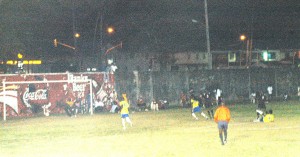 Alpha United’s custodian Ronson Williams dives to his right in a vain attempt to save this penalty kick. Pele won the Mayor’s Cup Sunday night after they triumphed 4 – 2 in a penalty shootout against Alpha United. (Aubrey Crawford Photo) 