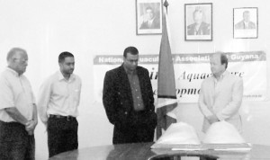 Officials at yesterday’s ceremony (from left to right) Chairman of NAAG Beni Sankar, Chief Fisheries Officer Nigel Dharamalall, Agriculture Minister Robert Persaud and British High Commissioner Fraser Wheeler. 