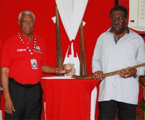  Lance Gibbs, left and Clive Lloyd display the Nostalgia products. (Photo courtesy of Digicel)  