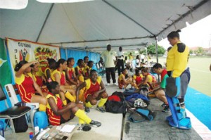 Flash back! National coach Phillip Fernandes talking to his troops at half time against Jamaica in the 2007 edition of the Caribbean Hockey Cup (Photo courtesy of the GHB)  