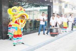 Hear me roar: The Chinese Lion was at the opening of the New Thriving restaurant on Main Street yesterday to welcome guests. (Jules Gibson photo) 