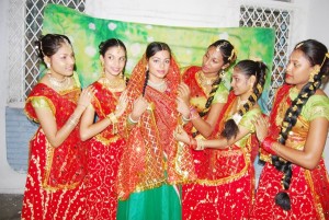 Pretima Prashnajeet (Sita) (third, left) with some of the dancers in the upcoming Ramlila production. (Guyana Hindu Dharmic Sabha photo)