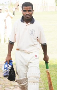 Ace Warriors’ opening batsman Abzal Gafoor leaves the field after being the last man dismissed for a well played 97. (A Clairmonte Marcus photo)